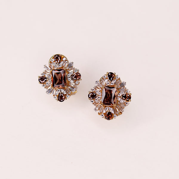Tops in Falsa and Cubic Zircons